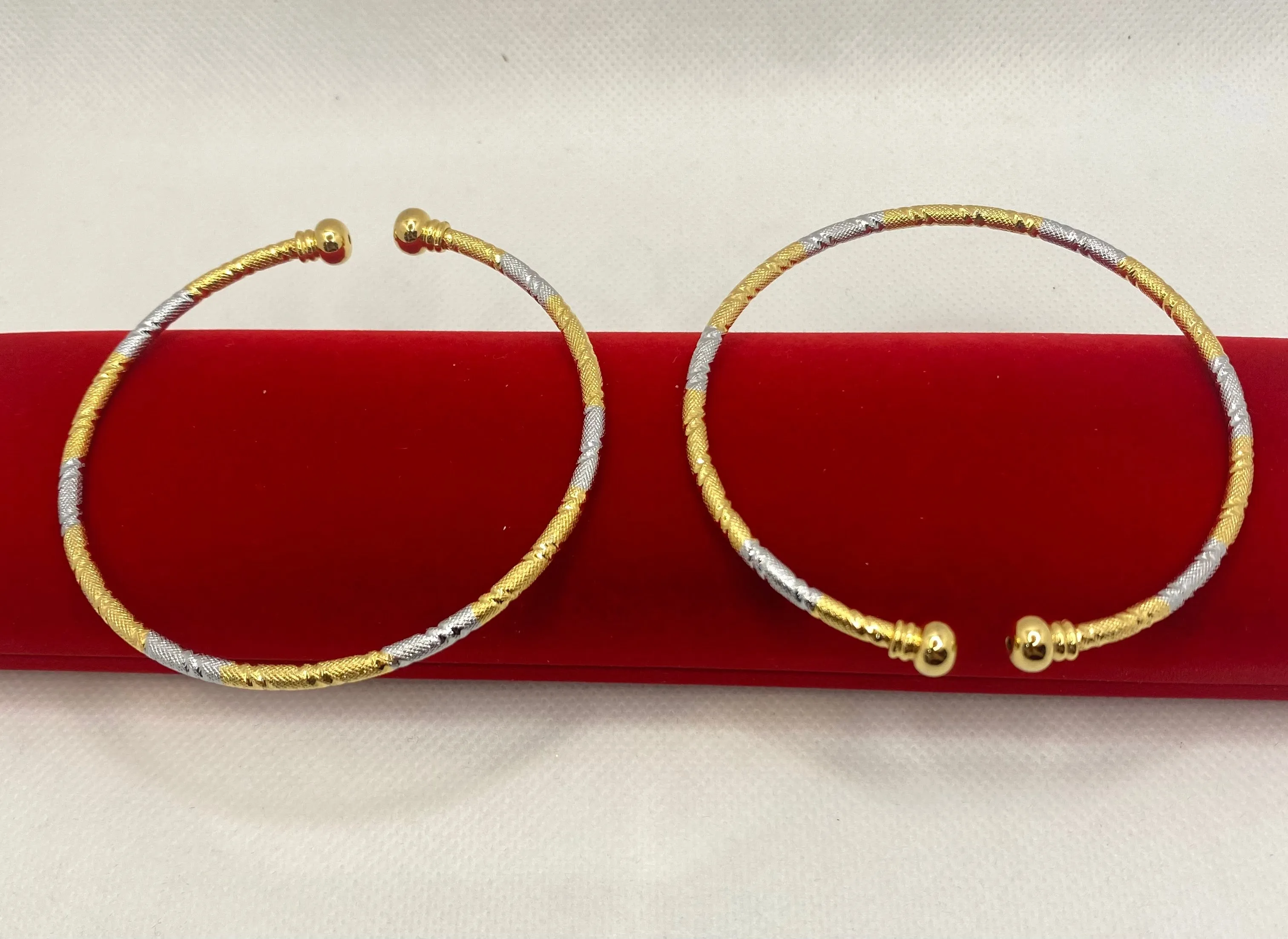 Gold plated free size bangles