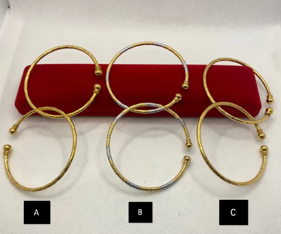 Gold plated free size bangles